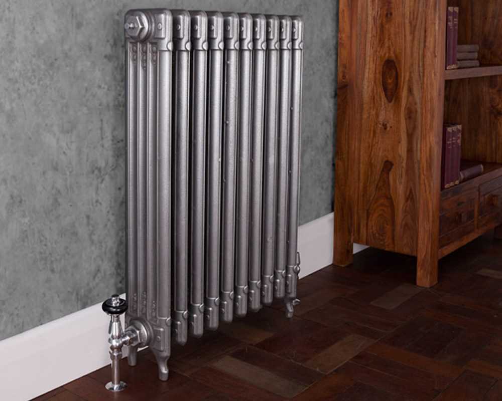 Deco cast iron radiator hand burnished in period property